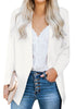 Front view of model wearing white open-front side pockets blazer