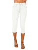 Model wearing white below knee skinny fit denim jeans shorts
