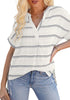 Model poses wearing white split V-neckline batwing sleeves striped loose top