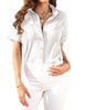 Model wearing white short cuffed sleeves pockets button-up top