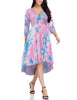 Front view of model wearing pink tie-dye high-low plus size wrap skater dress