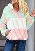 Model poses wearing light bluecolorblock half-zip hooded fleece pullover