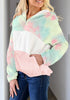 Angled shot of model wearing light blue colorblock half-zip hooded fleece pullover