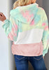 Back view of model wearing light blue colorblock half-zip hooded fleece pullover
