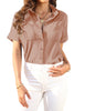 Model wearing blush short cuffed sleeves pockets button-up top