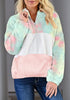 Front view of model wearing light blue colorblock half-zip hooded fleece pullover