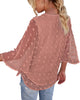 Back view of model wearing mauve 3/4 sleeves pompom tie-front top