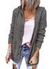 Front view of  model wearing dark grey button down melange waffle knit hooded cardigan