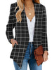 Front view of model wearing black plaid open-front side pockets blazer