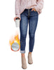 Front view of model wearing dark blue fleece-lined button-down denim skinny jeans