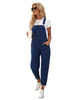 Model wearing dark blue cuffed denim bib jeans overalls