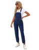 Angled shot of model wearing dark blue cuffed denim bib jeans overalls