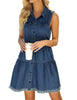 Model wearing dark blue button down collar sleeveless tiered denim dress