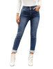 Front view of model wearing light blue triple button fleece-lined skinny denim jeans