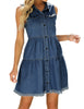 Angled shot of model wearing dark blue button down collar sleeveless tiered denim dress