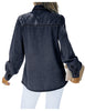 Back view of model wearing dark blue puff sleeves button-down top