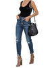 Full shot of model wearing blue high-waist button-up frayed raw hem ripped cropped jeans