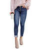 Model wearing dark blue fleece-lined button-down denim skinny jeans