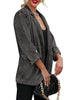 Side view of model wearing grey lapel collar flap pockets open-front denim blazer