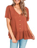 Front view of model waring brown V-neckline buttons loose peplum top