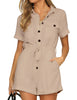 Front view of model wearing light mauve short sleeves button-down belted romper