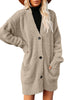 Front view of model wearing beige button down drop shoulders oversized knit cardigan