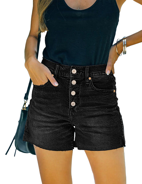 Front view of model wearing black raw hem mid-waist distressed denim shorts