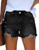 Model wearing black high waist ruched hem distressed denim shorts