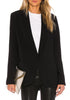 Front view of model wearing black lapel patch pockets boyfriend blazer