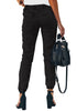 Back view of model wearing black elastic-waist welt pockets denim jogger pants