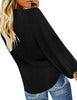 Back view of model wearing black long sleeves swiss dot button down tie-front top