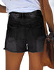 Back view of model wearing black high waist ruched hem distressed denim shorts