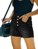 Angled shot of model wearing black raw hem mid-waist distressed denim shorts