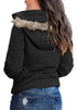 Back view of model wearing black faux fur hooded zip up quilted jacket
