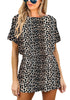 Front view of model wearing leopard-print short sleeves keyhole-back belted romper
