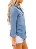 Side view of model wearing blue long sleeves button-up denim shirt