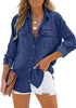 Posing model wearing dark blue long sleeves button-down denim shirt
