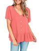 Back view of model wearing coral pink V-neckline buttons loose peplum top