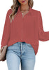 Model poses wearing dark blush lantern sleeves button-down pleated chiffon top