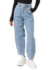 Front view of model wearing light blue high-waist loose denim mom jeans