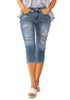 Front view of model wearing light blue below knee cropped skinny denim jeans