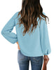 Back view of model wearing light blue V-neckline bishop sleeves loose fit women's top