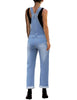 Back view of model in blue cuffed hem ripped bib denim overall jumpsuit