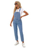 Model poses wearing light blue cuffed denim bib jeans overalls