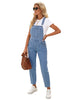 Angled shot of model wearing light blue cuffed denim bib jeans overalls