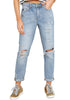 Model wearing light blue cuffed hem ripped boyfriend jeans