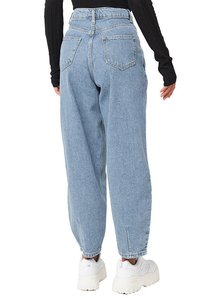 Back view of model wearing light blue high-waist loose denim mom jeans