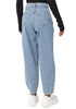 Back view of model wearing light blue high-waist loose denim mom jeans