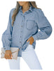 Front view of model wearing light blue puff sleeves button-down top