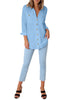 Front full body shot of model wearing light blue long cuffed sleeves lapel button-up blouse